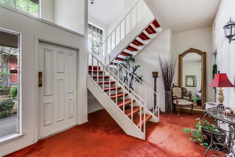 a view of entryway livingroom and hall