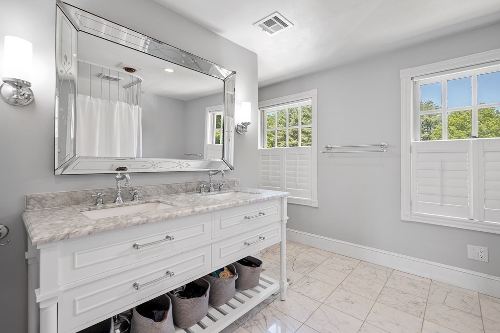 154 Harvard Road Stow, MA 01775 - Photo 17 of 42 a bathroom with a granite countertop sink and a mirror