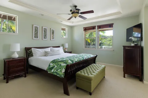 a bedroom with a bed furniture and a window