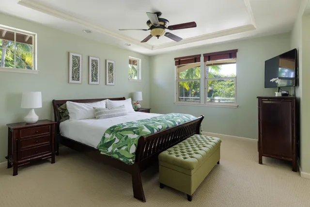 a bedroom with a bed furniture and a window