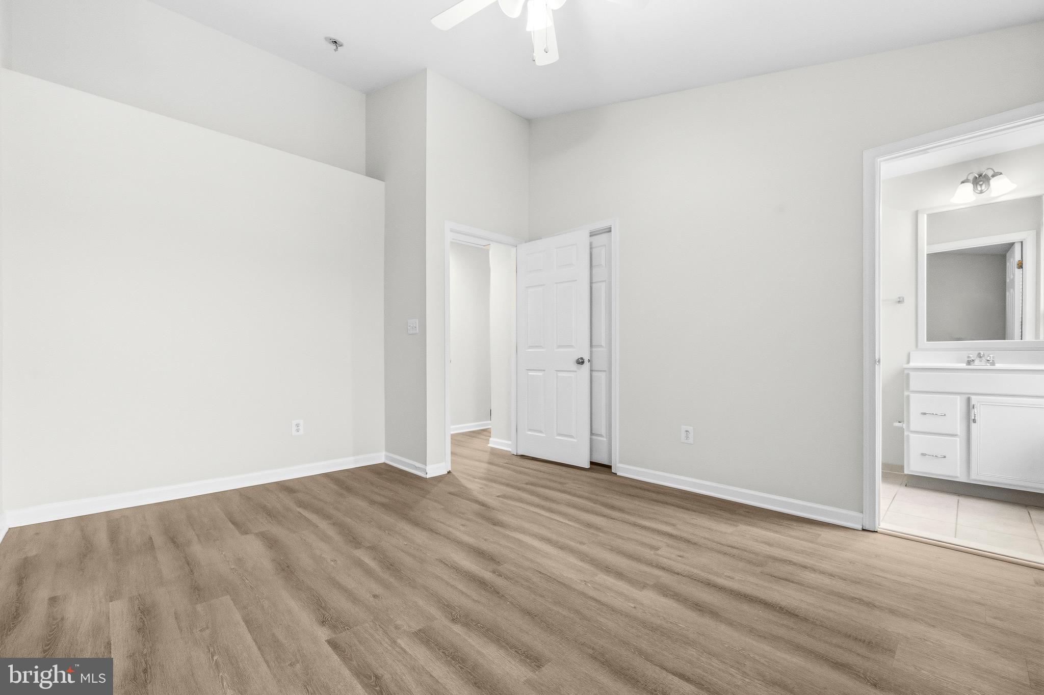 25154 Monteith Terrace Chantilly, VA 20152 - Photo 19 of 40 a view of a room with wooden floor