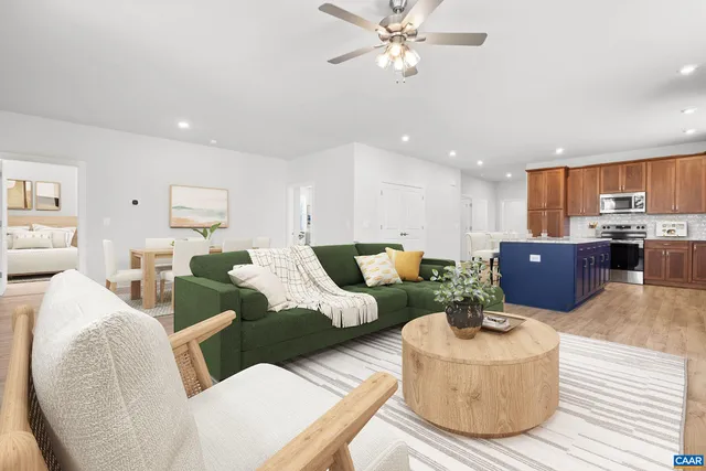 a view of kitchen and hall with wooden floor