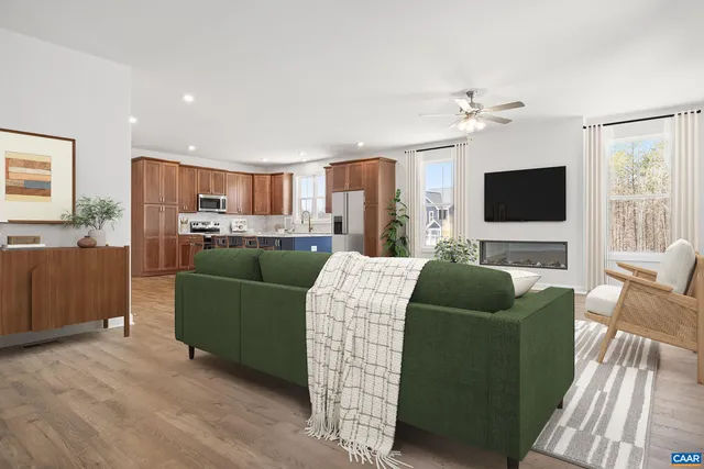 a kitchen with stainless steel appliances granite countertop wooden cabinets a sink and dishwasher