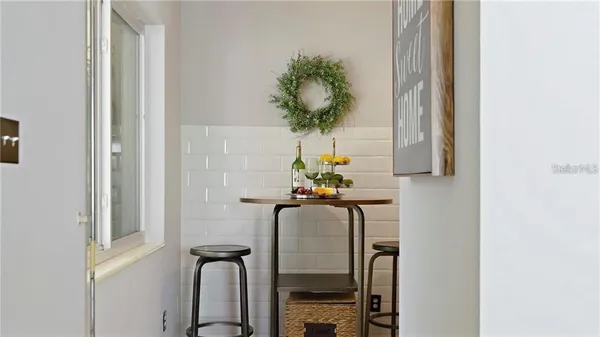 a view of balcony with furniture