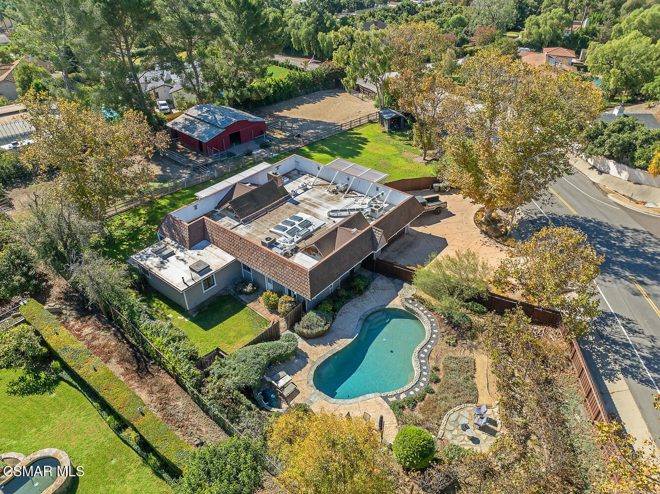 an aerial view of a house with a garden