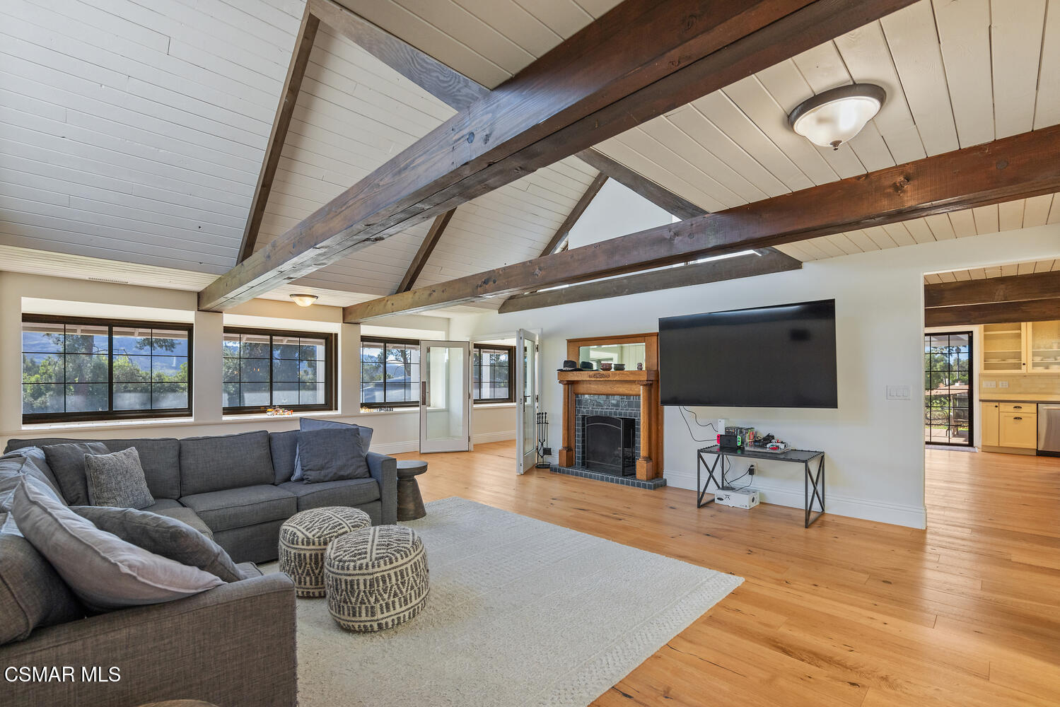 11316 Barranca Road Camarillo, CA 93012 - Photo 9 of 44 a living room with furniture and a flat screen tv