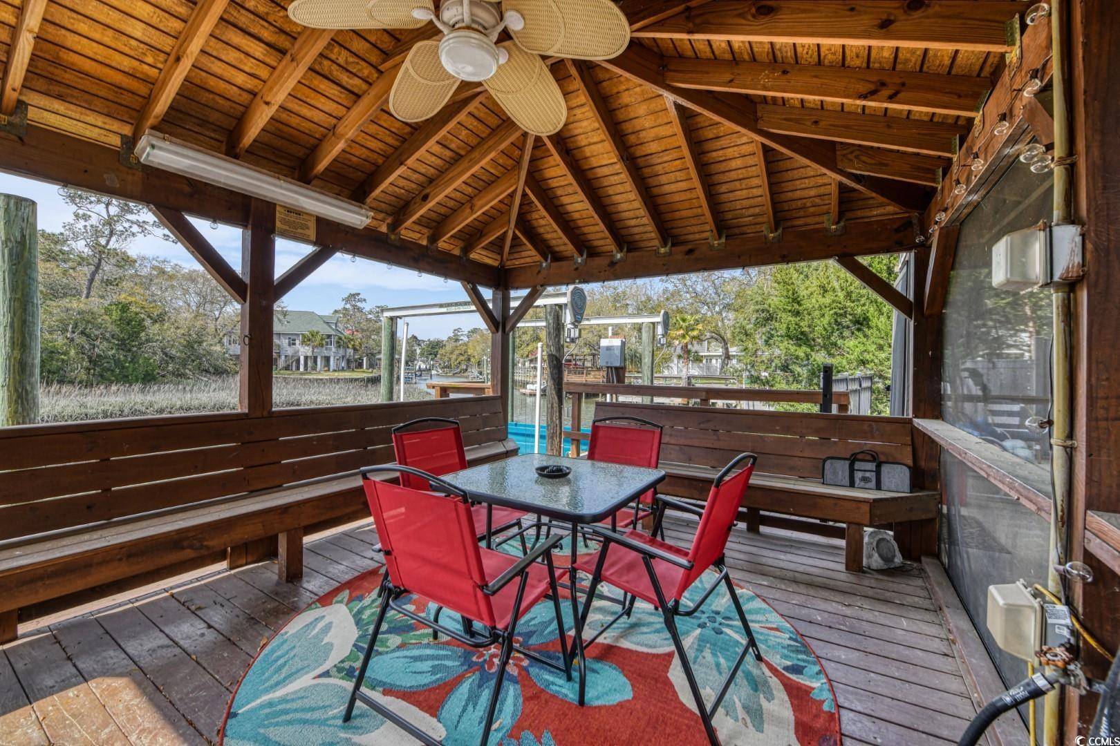 3714 Jordan Landing Road Murrells Inlet, SC 29576 - Photo 29 of 39 Wooden terrace with ceiling fan