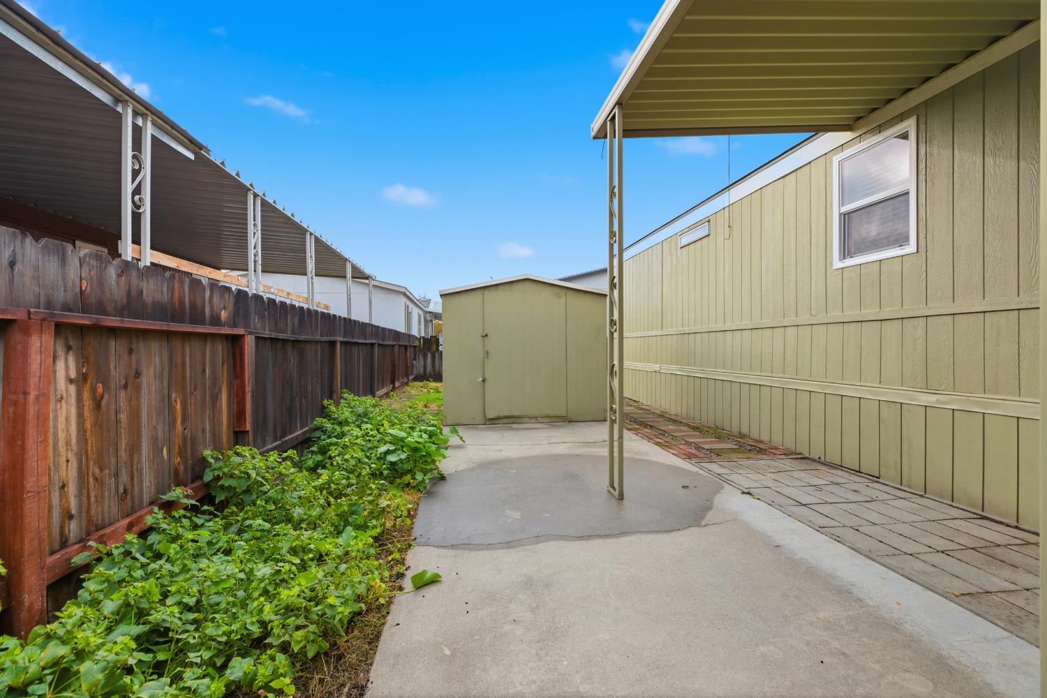 2307 Oakdale Road, Unit 15 Modesto, CA 95355 - Photo 15 of 17 a backyard of a house