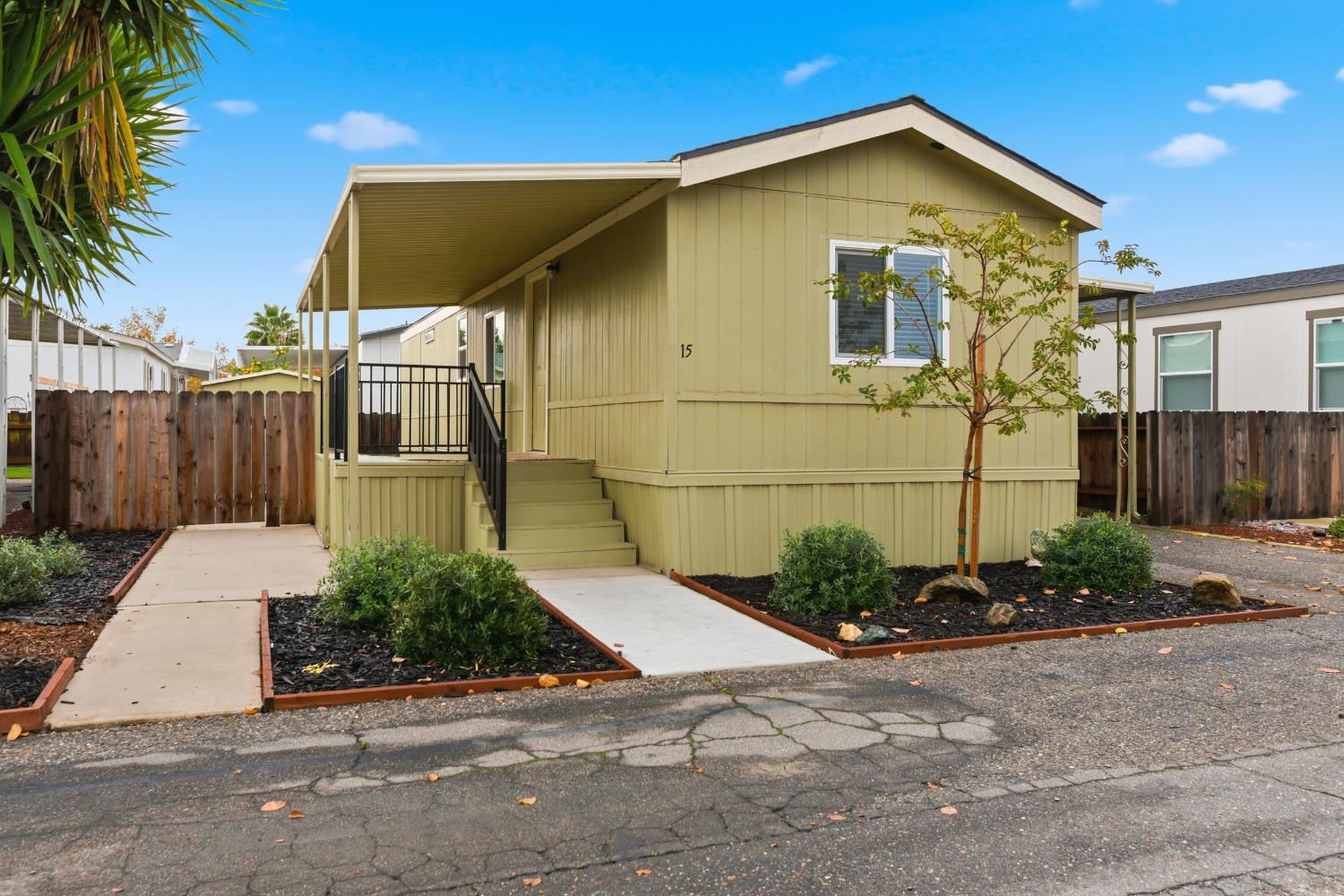 2307 Oakdale Road, Unit 15 Modesto, CA 95355 - Photo 3 of 17 a view of a back yard of the house