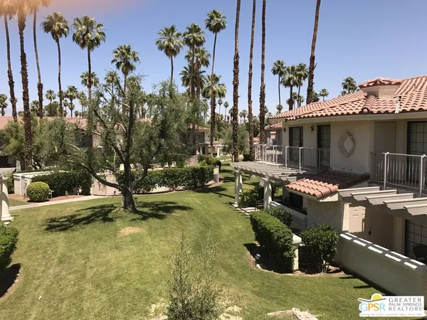 a view of a house with swimming pool