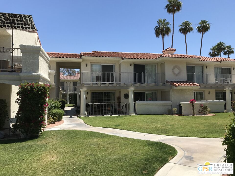 2701 East Mesquite Avenue, Unit GG180 Palm Springs, CA 92264 - Photo 23 of 26 a front view of a house with garden