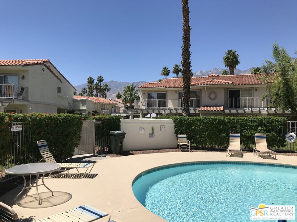 2701 East Mesquite Avenue, Unit GG180 Palm Springs, CA 92264 - Photo 26 of 26 a view of a house with backyard porch and sitting area