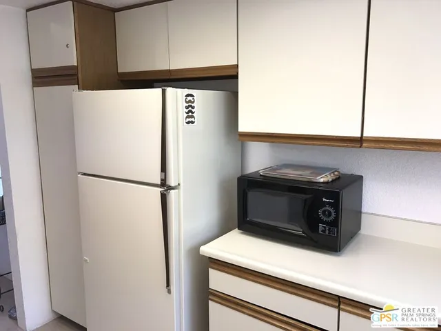 a utility room with washer and dryer