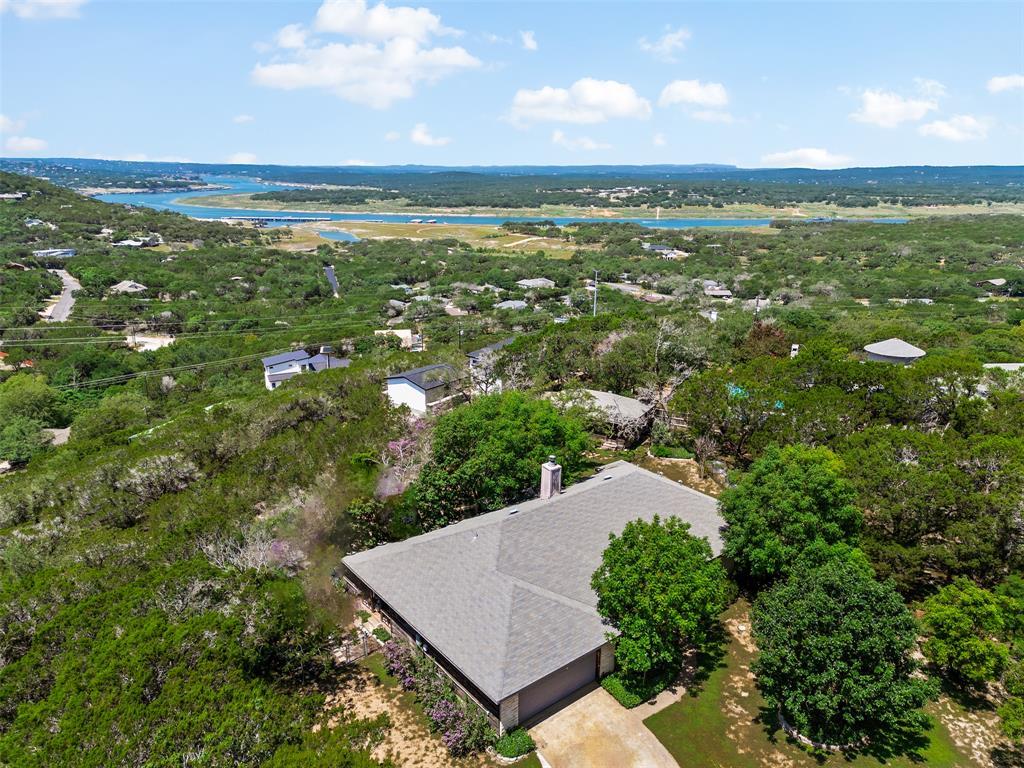 21013 Ridgeview Loop Lago Vista, TX 78645 - Photo 1 of 16 Aerial view of the home with views of Lake Travis and Hill Country