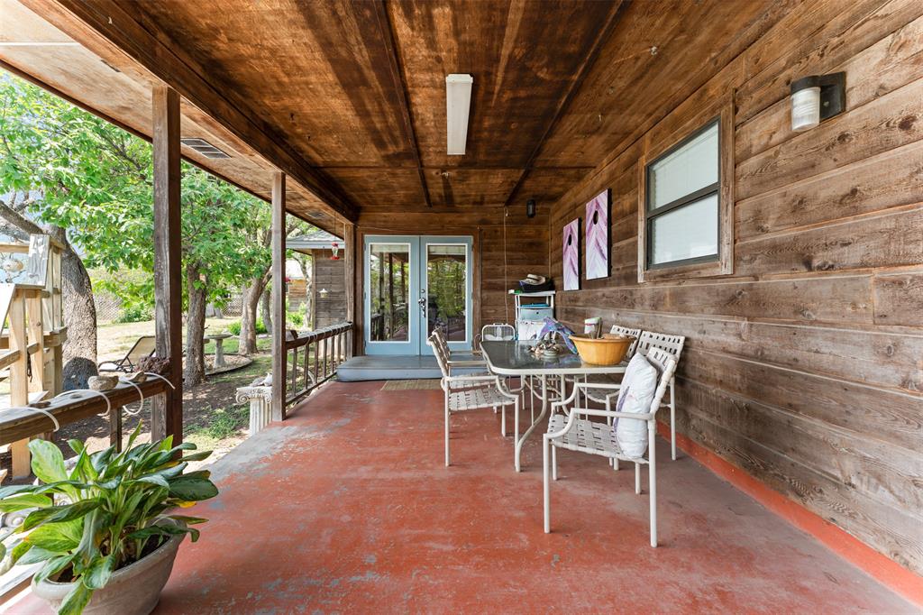 21013 Ridgeview Loop Lago Vista, TX 78645 - Photo 14 of 16 Covered patio area with awesome views of Lake Travis and the hill country