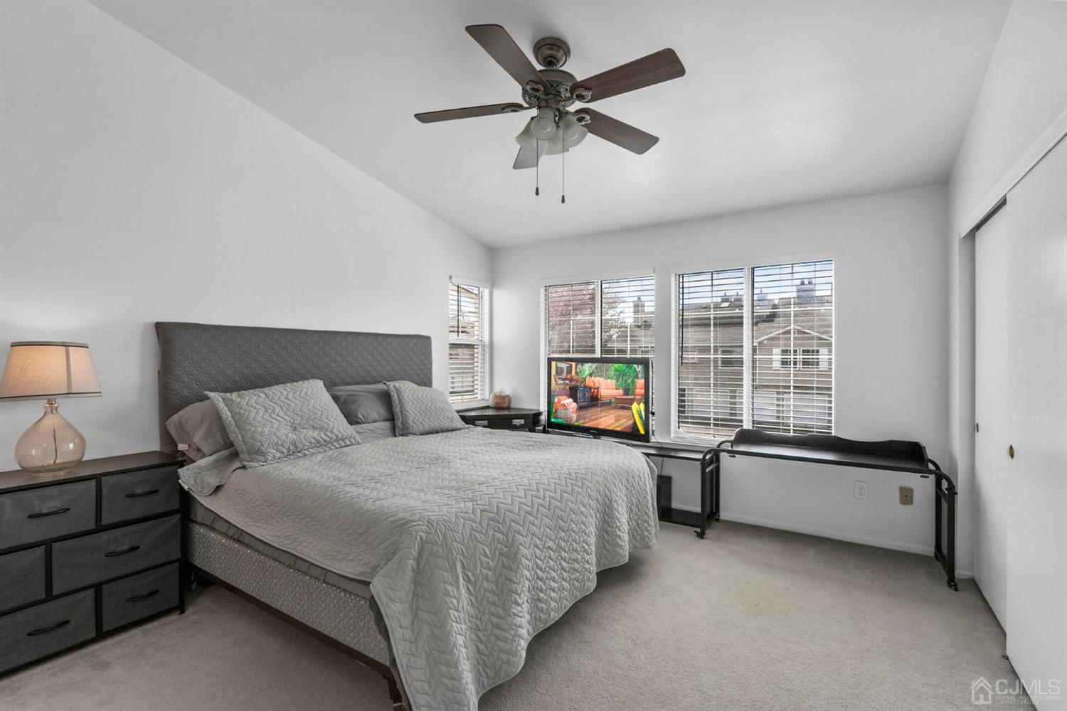 17 Bentley Court Bedminster, NJ 07921 - Photo 12 of 44 a spacious bedroom with a bed and a window