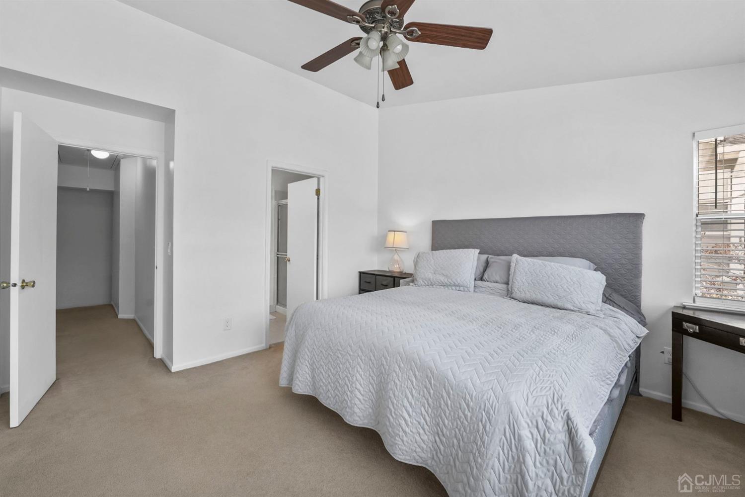 17 Bentley Court Bedminster, NJ 07921 - Photo 13 of 44 a bedroom with a bed and ceiling fan