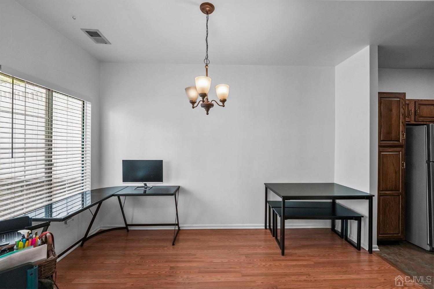 17 Bentley Court Bedminster, NJ 07921 - Photo 19 of 44 a workspace with furniture and a window