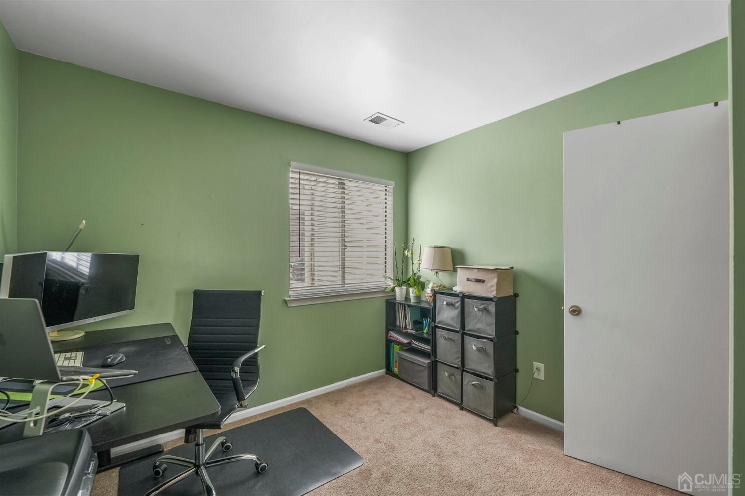 17 Bentley Court Bedminster, NJ 07921 - Photo 22 of 44 a workspace with furniture and a window