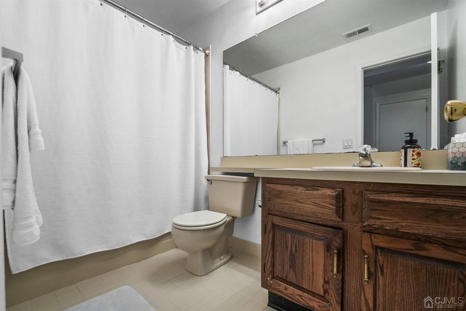 17 Bentley Court Bedminster, NJ 07921 - Photo 25 of 44 a bathroom with a sink toilet and shower