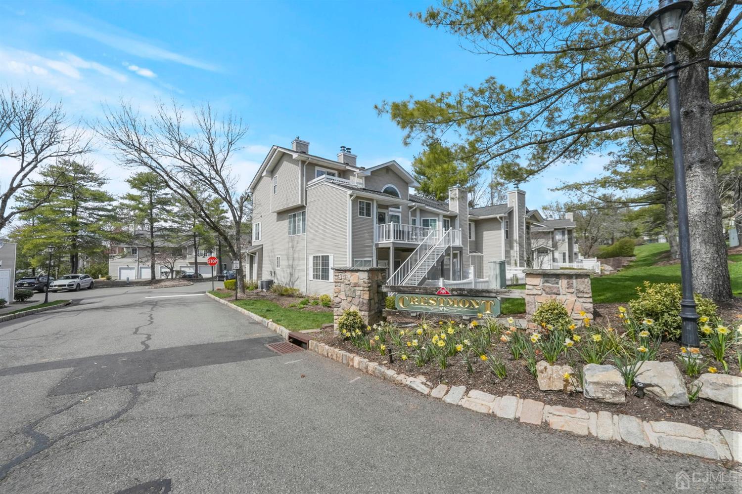 17 Bentley Court Bedminster, NJ 07921 - Photo 31 of 44 a front view of a house with a yard