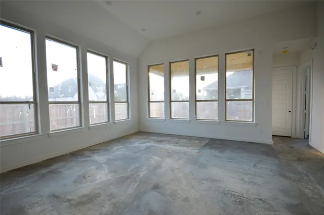 an empty room with windows