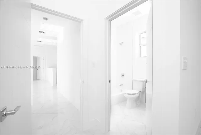 a bathroom with a toilet