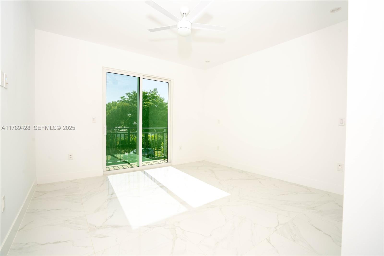 900 Southwest 24th Road Miami, FL 33129 - Photo 22 of 27 a view of a room with a large window