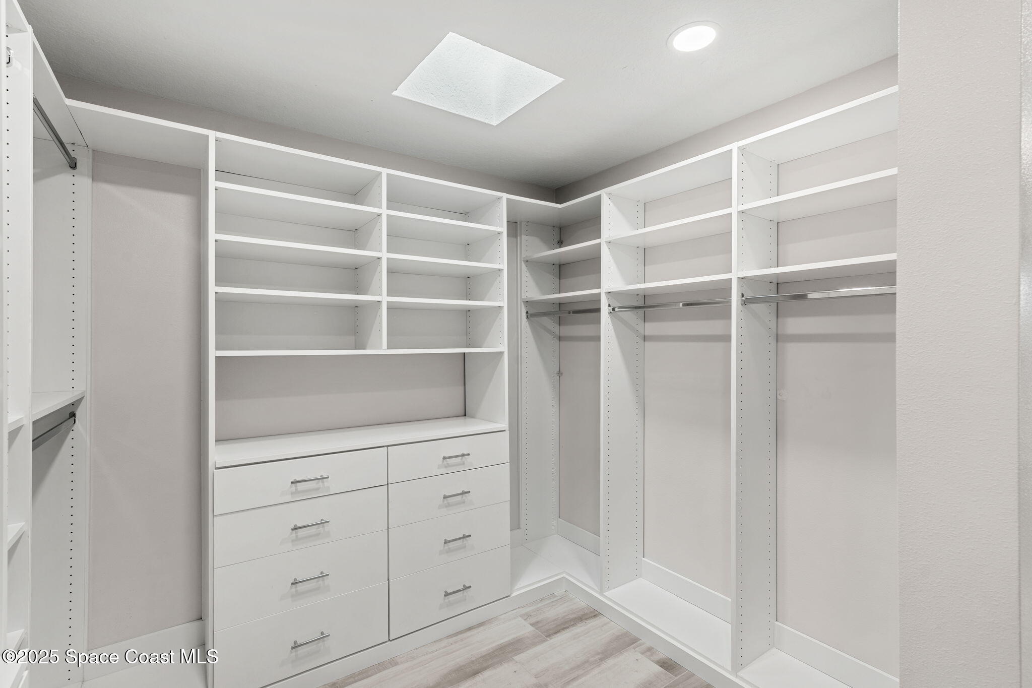 2187 Turtle Mound Road Melbourne, FL 32934 - Photo 39 of 77 a view of an empty walk in closet