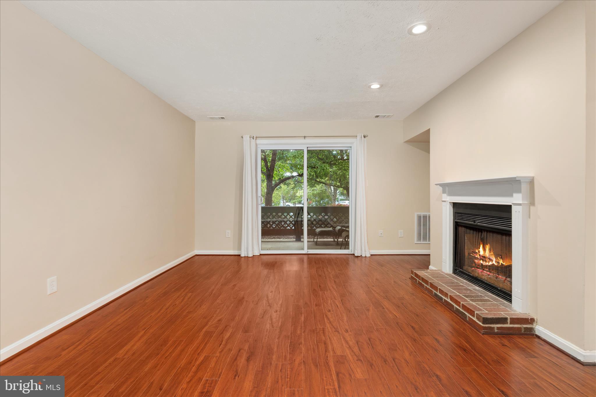 10110 Oakton Terrace Road, Unit 10110 Oakton, VA 22124 - Photo 12 of 27 Spacious Living Room with fireplace