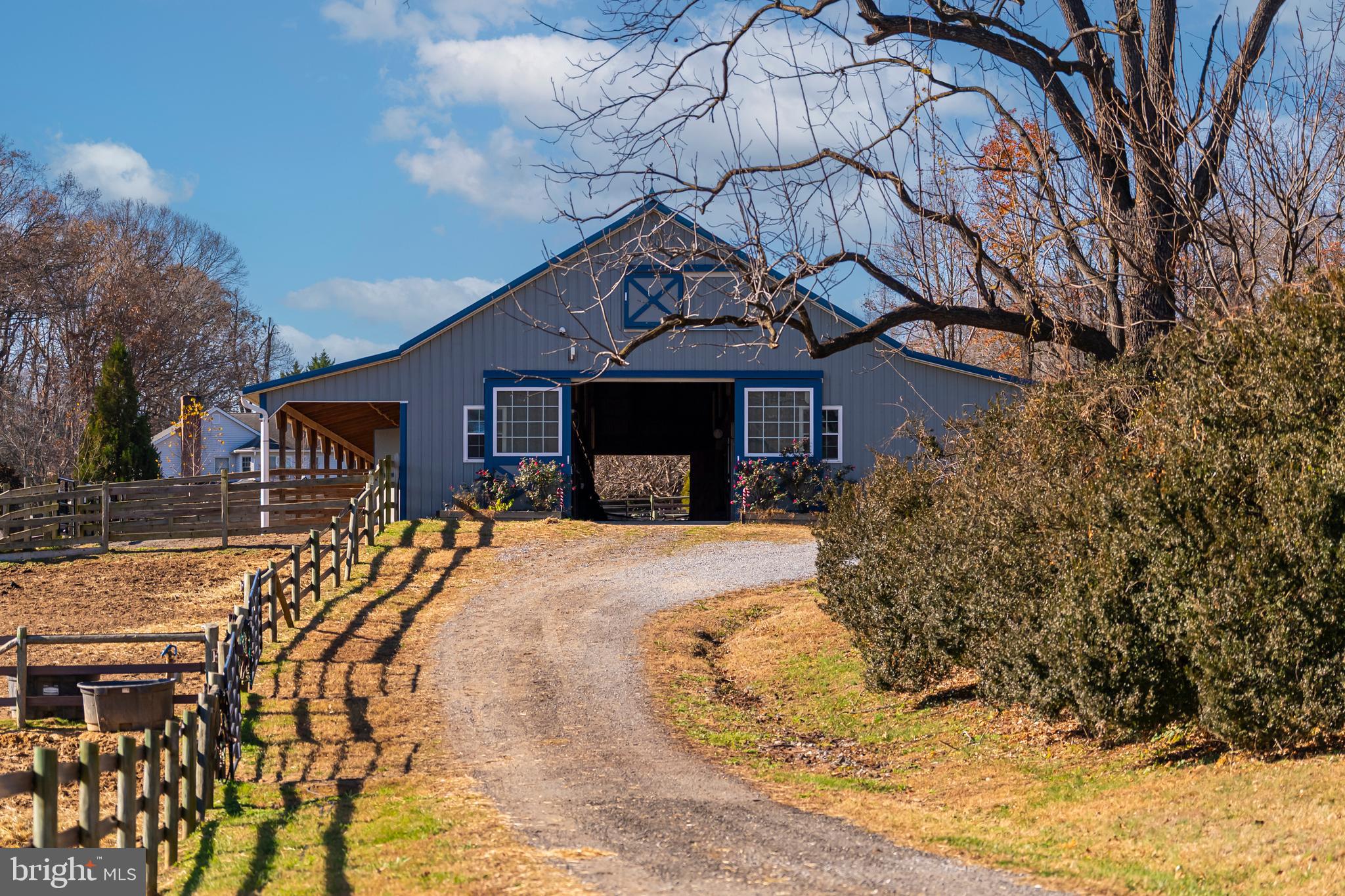 19209 Croom Road Brandywine, MD 20613 - Photo 37 of 95 a front view of a house with a yard