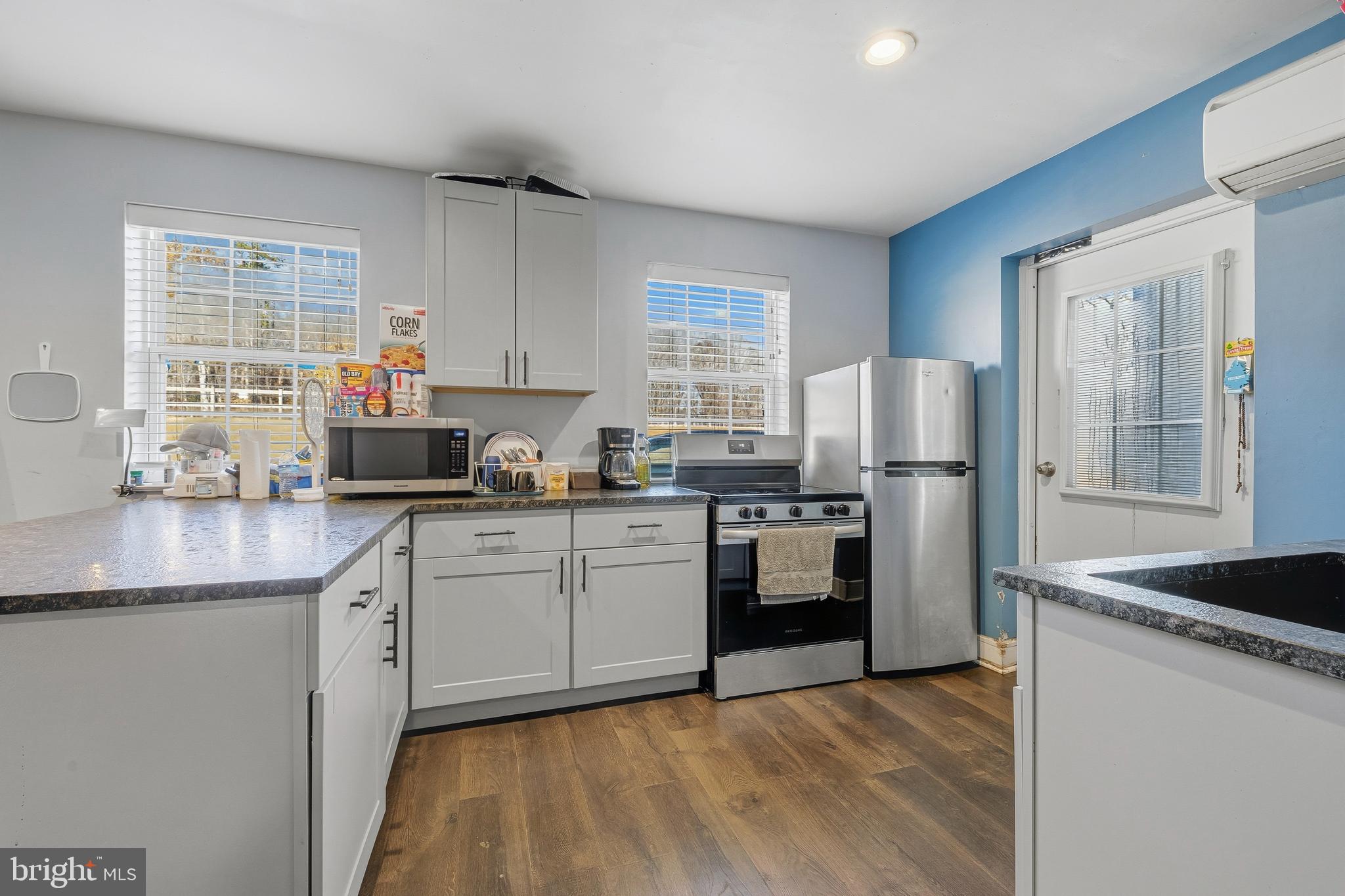 19209 Croom Road Brandywine, MD 20613 - Photo 58 of 95 a kitchen with stainless steel appliances granite countertop a refrigerator sink and stove