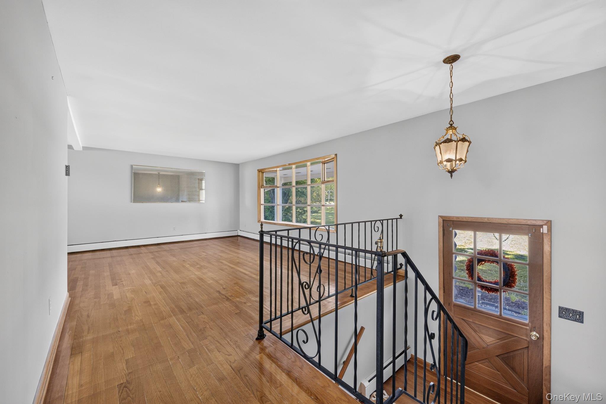 315 Pine Bush Road Stone Ridge, NY 12484 - Photo 8 of 32 a view of an entryway with wooden floor