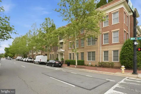 a view of a building with a street