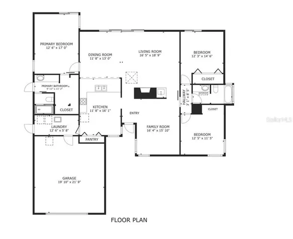 a view of a livingroom with a fireplace a chandelier and windows