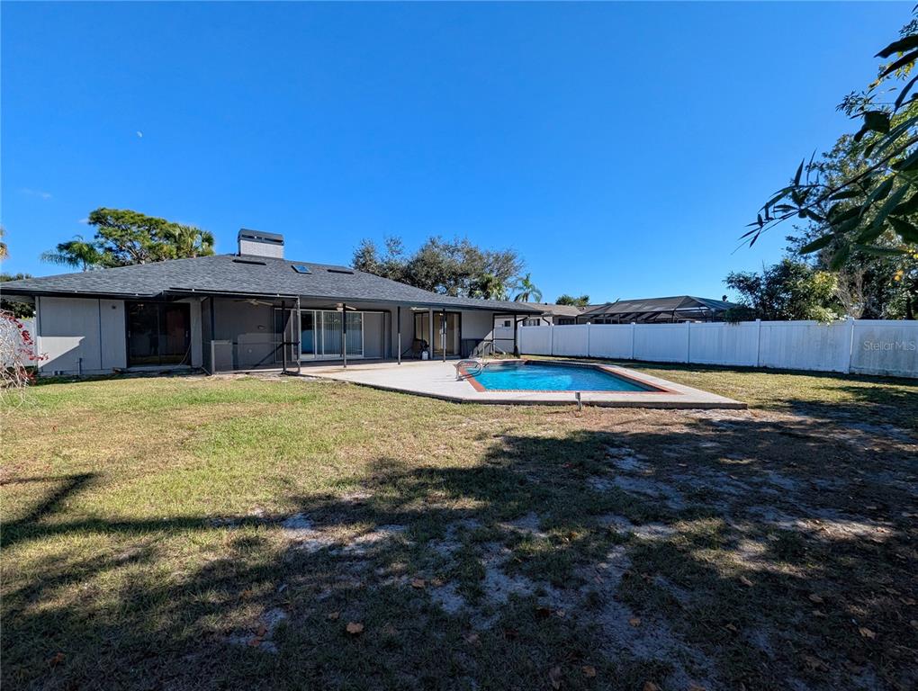 1329 Pine Needle Road Venice, FL 34285 - Photo 28 of 43 a view of a house with swimming pool