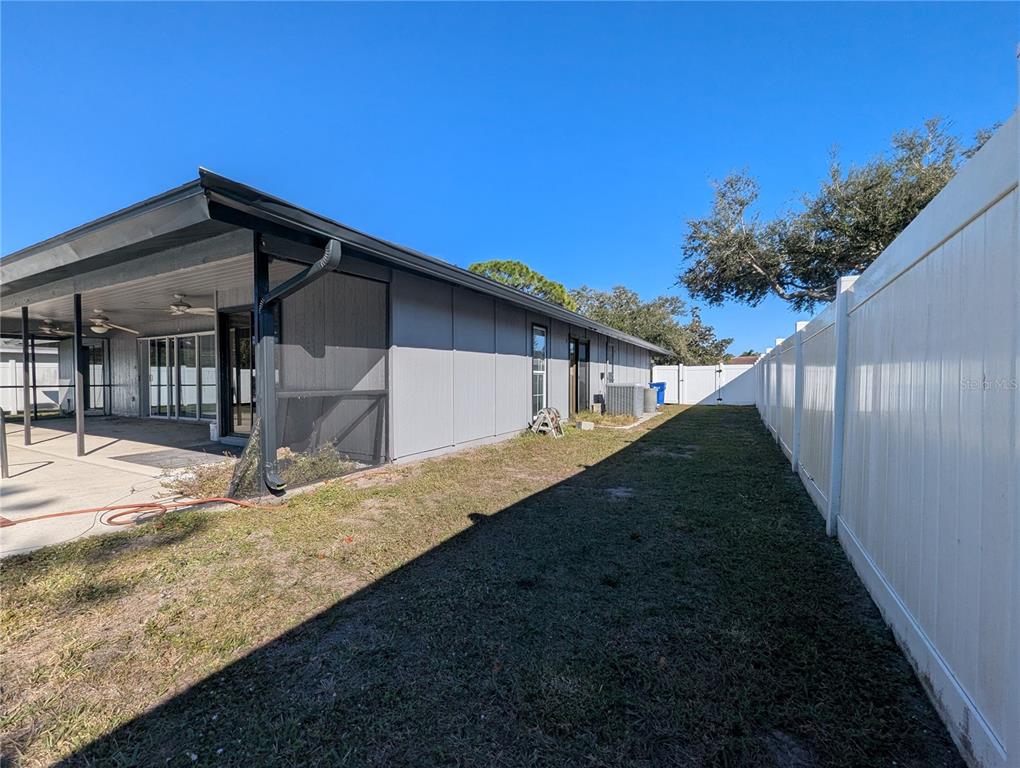 1329 Pine Needle Road Venice, FL 34285 - Photo 31 of 43 a house view with a backyard space