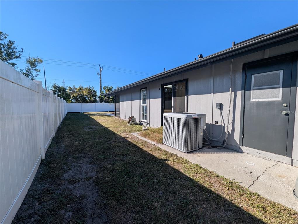 1329 Pine Needle Road Venice, FL 34285 - Photo 32 of 43 a view of a back yard of the house