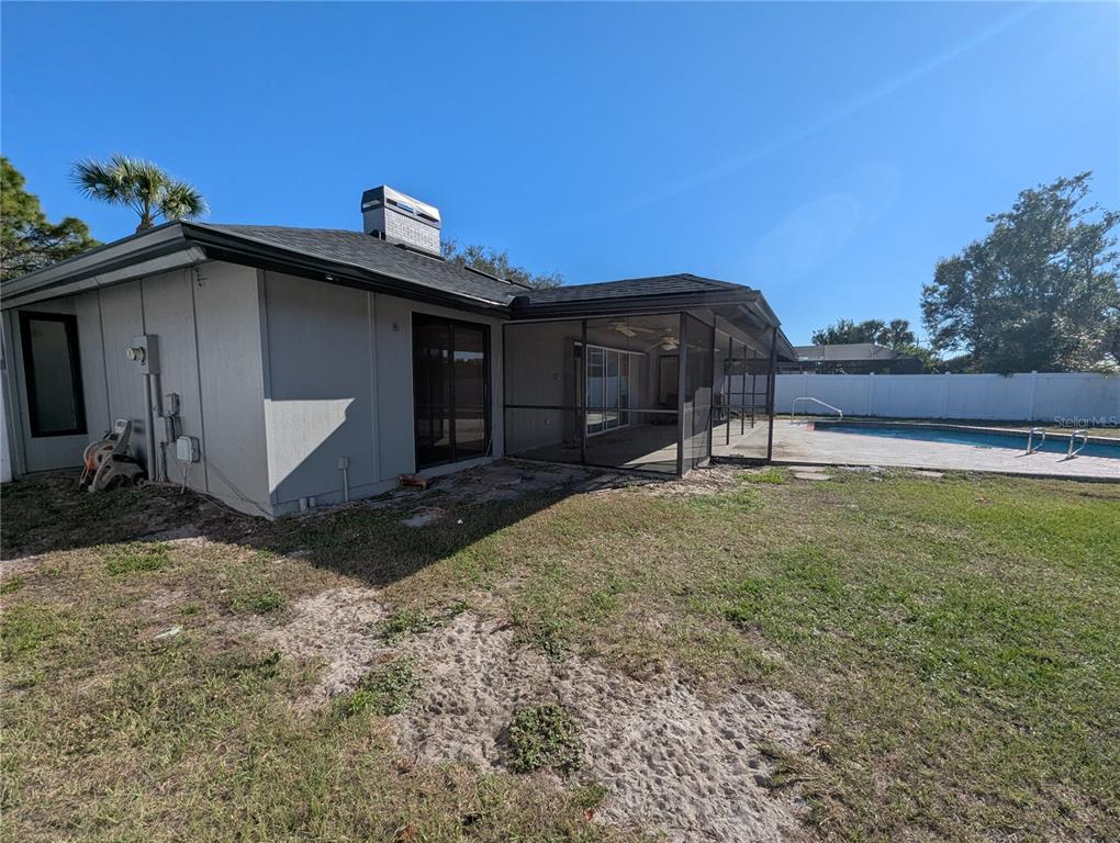 1329 Pine Needle Road Venice, FL 34285 - Photo 33 of 43 a view of a house with a yard