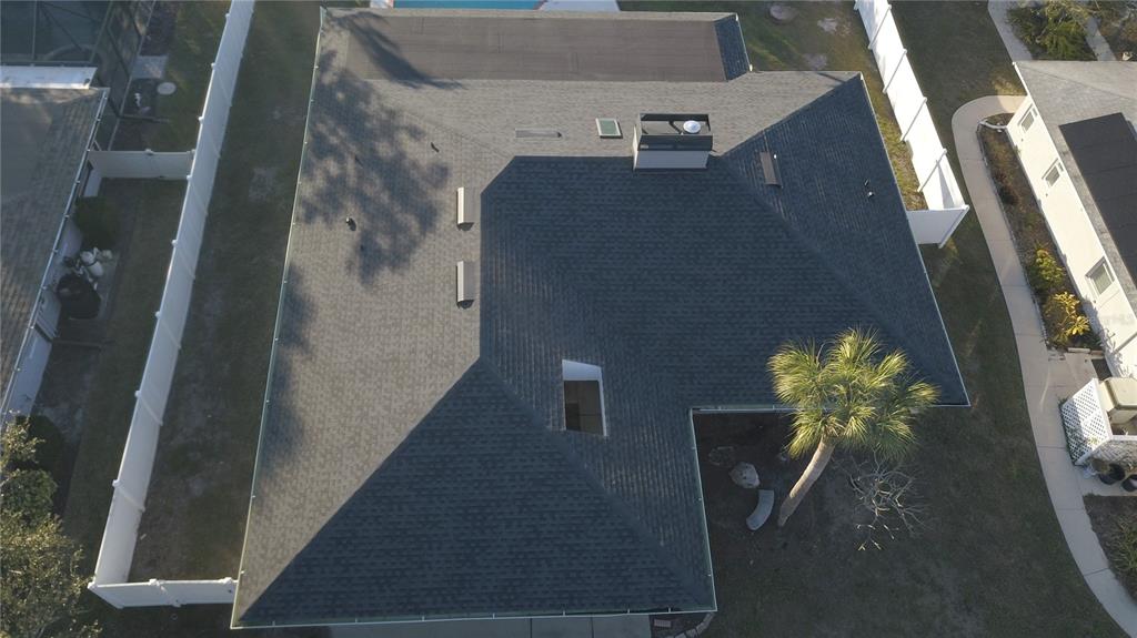 1329 Pine Needle Road Venice, FL 34285 - Photo 39 of 43 a vase of flowers sitting on a floor