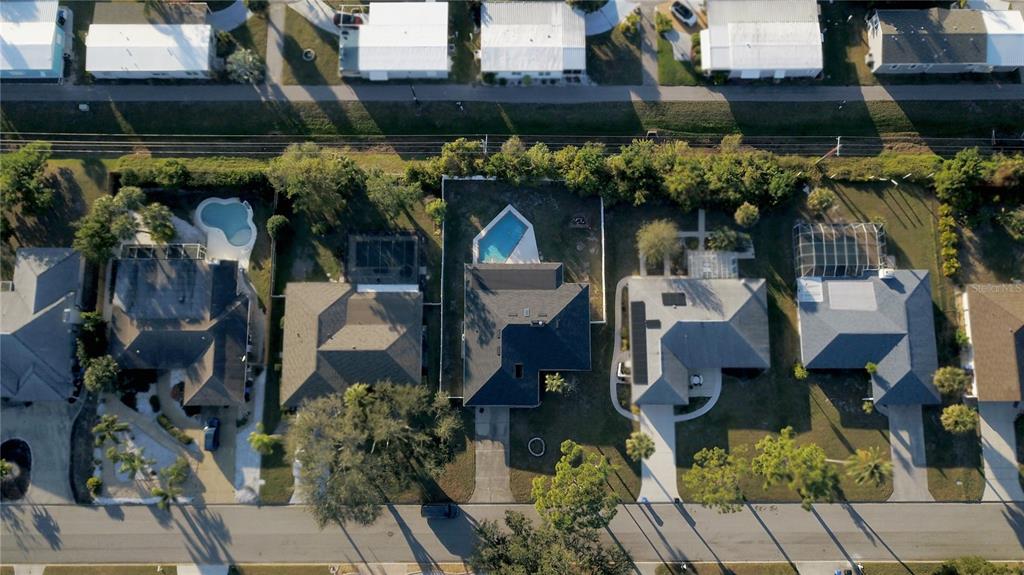 1329 Pine Needle Road Venice, FL 34285 - Photo 41 of 43 an outdoor space with lots of green space