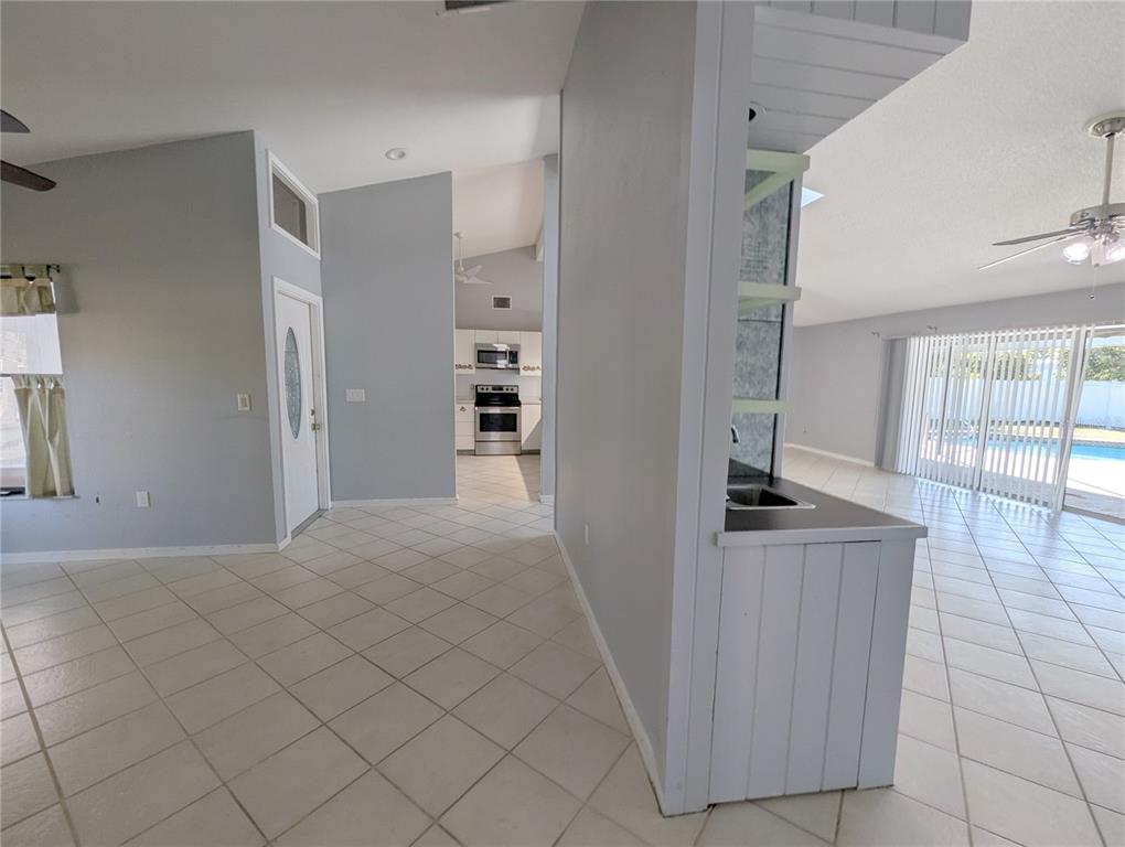 1329 Pine Needle Road Venice, FL 34285 - Photo 8 of 43 a view of a kitchen