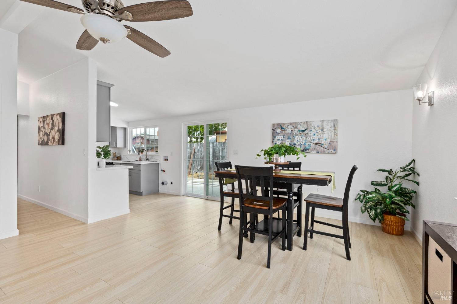 240 Rinaldo Drive Vallejo, CA 94589 - Photo 11 of 41 a view of a dining room with furniture and wooden floor