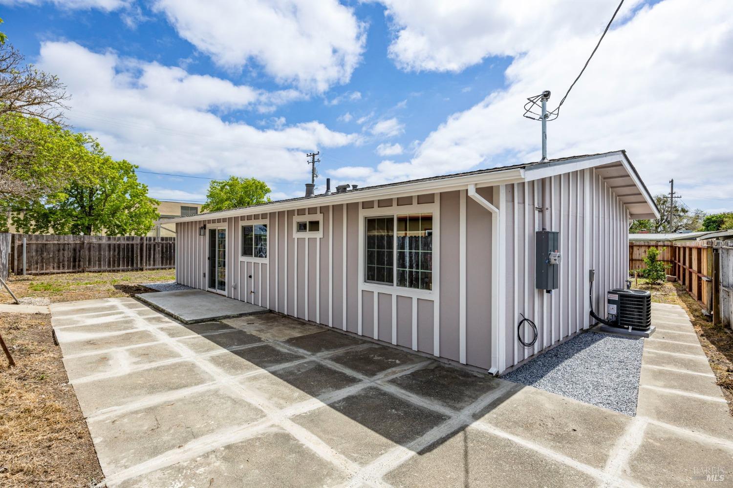 240 Rinaldo Drive Vallejo, CA 94589 - Photo 2 of 41 a view of a house with backyard and wooden fence