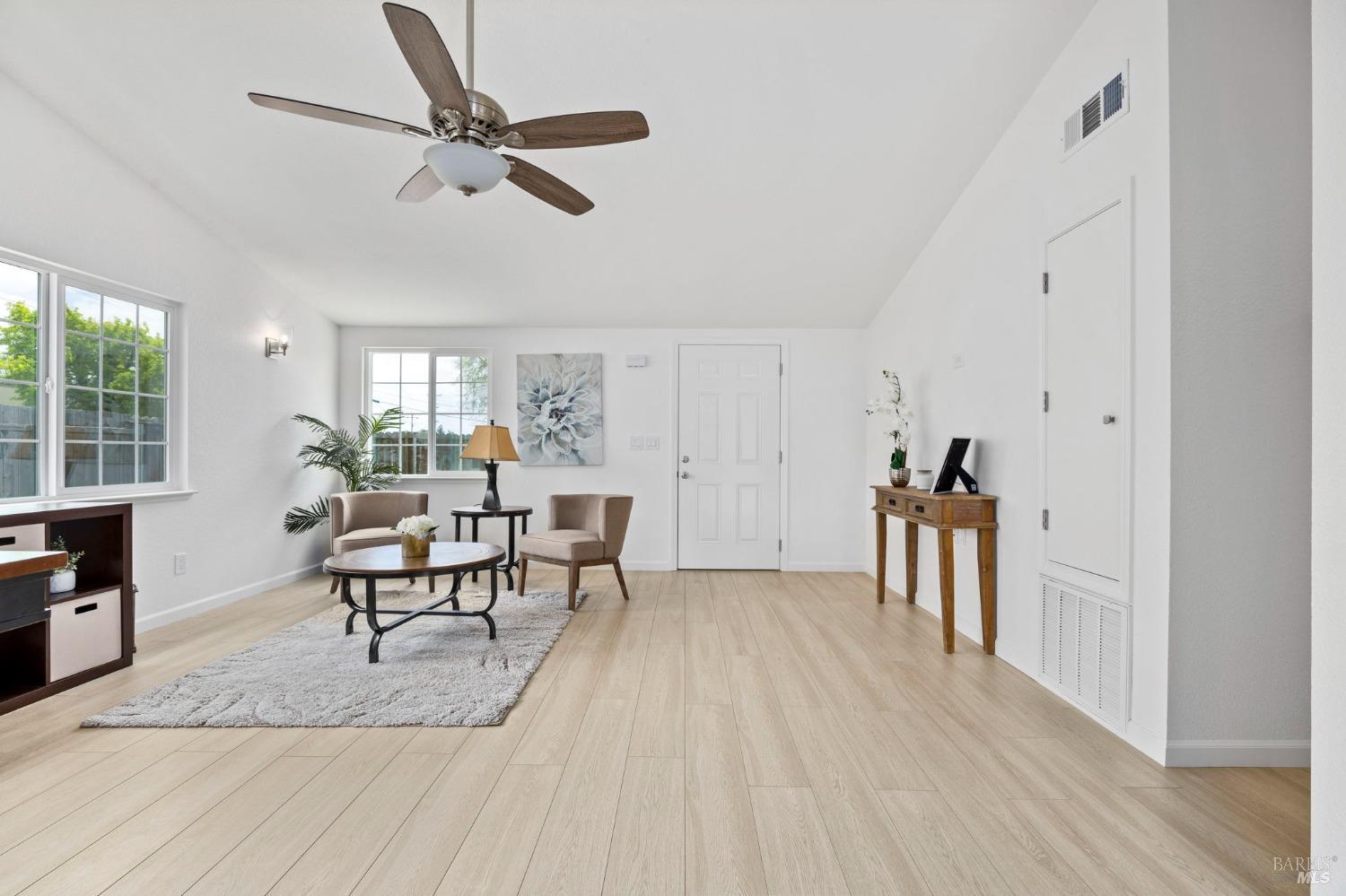 240 Rinaldo Drive Vallejo, CA 94589 - Photo 8 of 41 a living room with furniture and a wooden floor