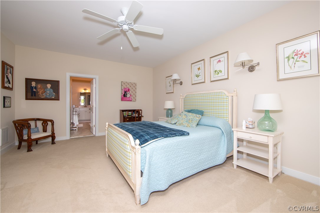 163 Button Bush Road Richmond, VA 23238 - Photo 18 of 46 a bedroom with a bed and a chair