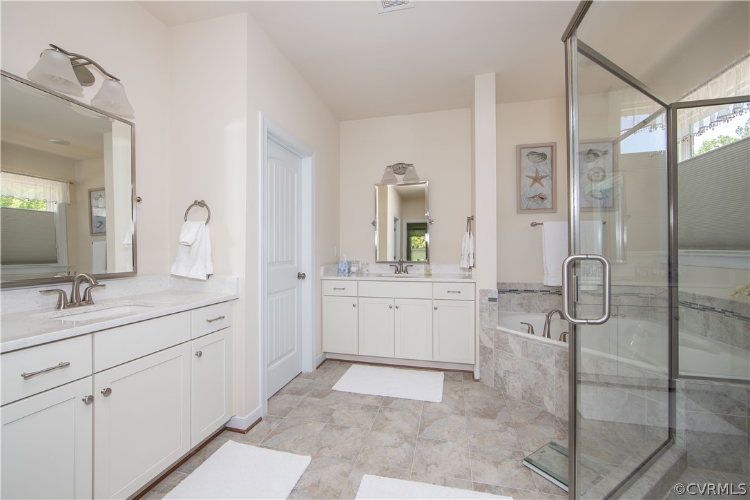 163 Button Bush Road Richmond, VA 23238 - Photo 19 of 46 a bathroom with a double vanity sink mirror and shower