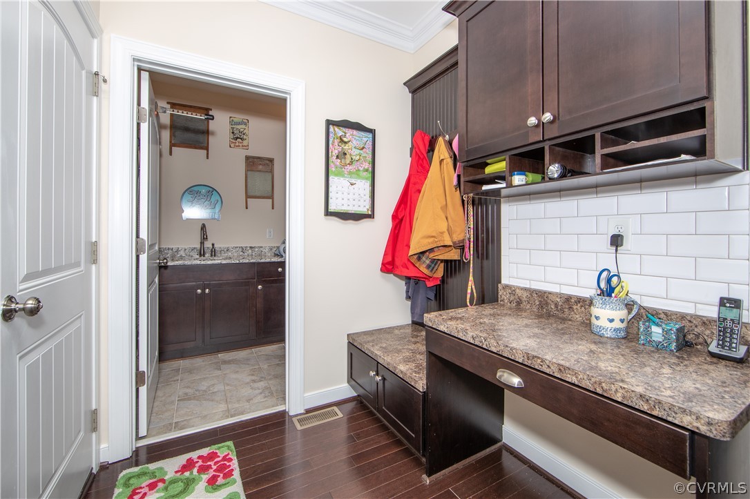 163 Button Bush Road Richmond, VA 23238 - Photo 23 of 46 a kitchen with a sink dishwasher and cabinets