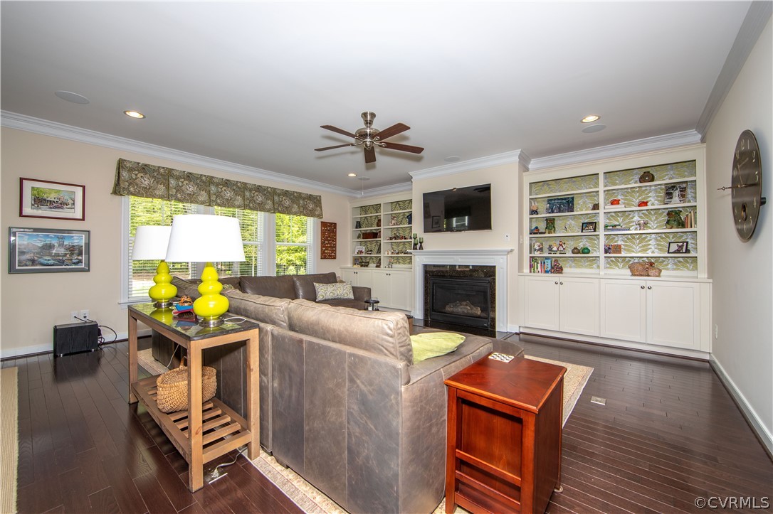 163 Button Bush Road Richmond, VA 23238 - Photo 24 of 46 a living room with furniture a fireplace and a flat screen tv