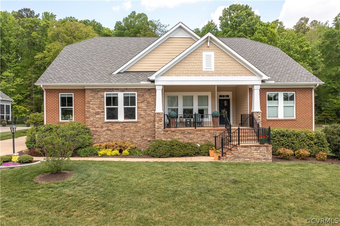 163 Button Bush Road Richmond, VA 23238 - Photo 3 of 46 a front view of a house with a yard